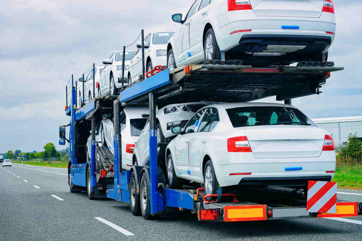 New cars are transported on a truck.